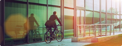 Business person cycling to work